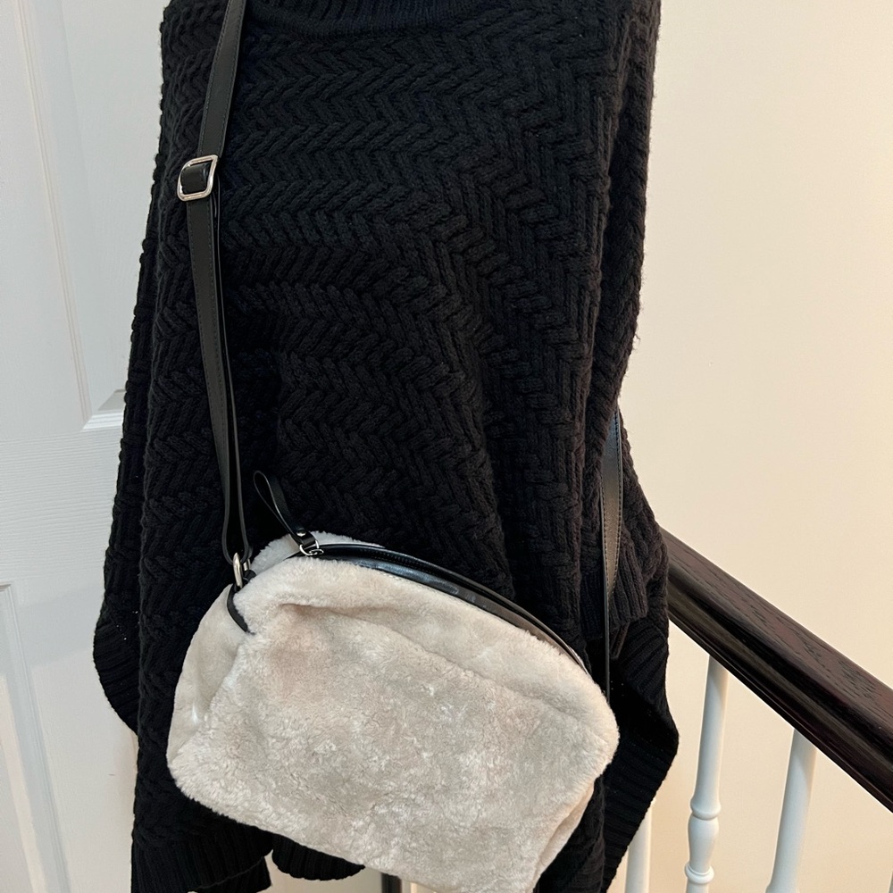 La CANADIENNE Cream Teddy crossbody bag with dust bag.